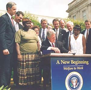 Clinton signing legislation