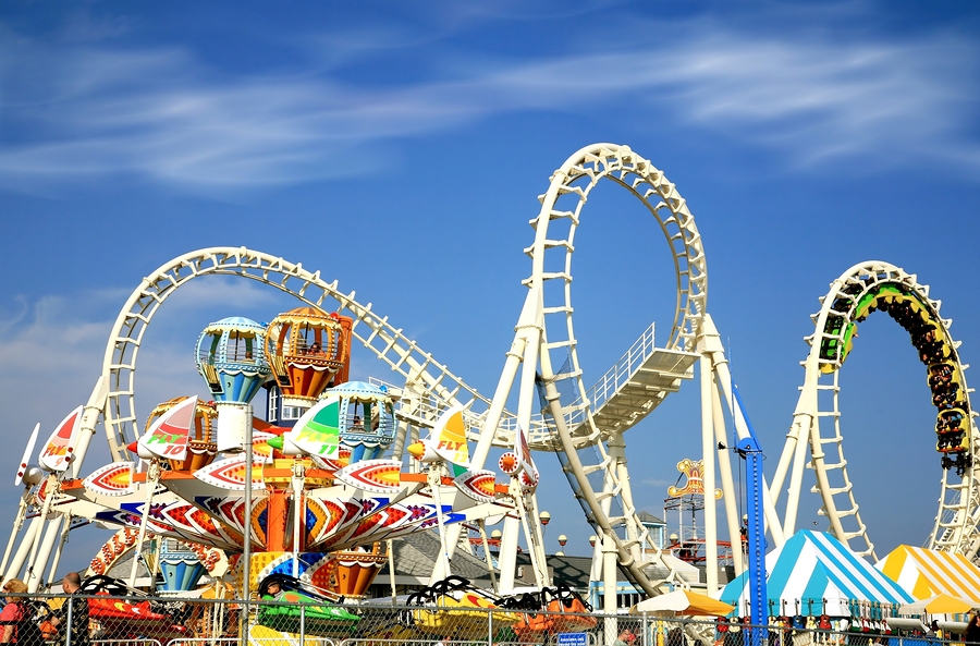 Amusement park rides with a very blue sky as background